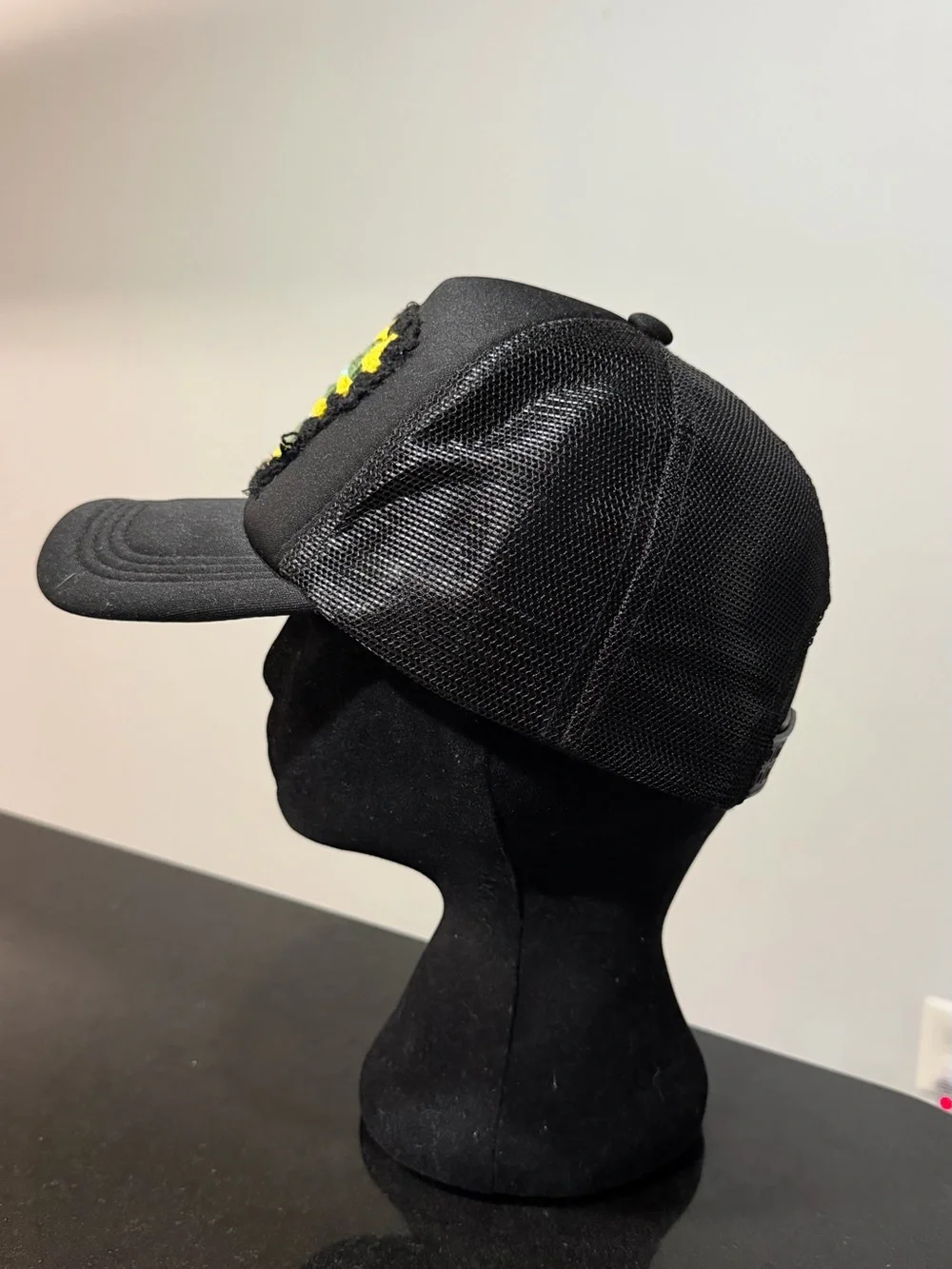 Black Truckers Hat with Crochet Granny Square.
